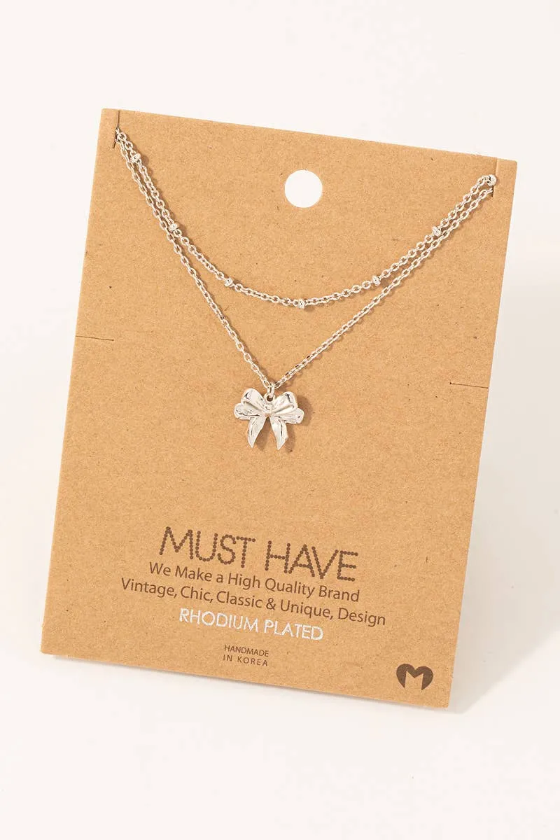Gold Dipped Knotted Ribbon Bow Pendant Necklace