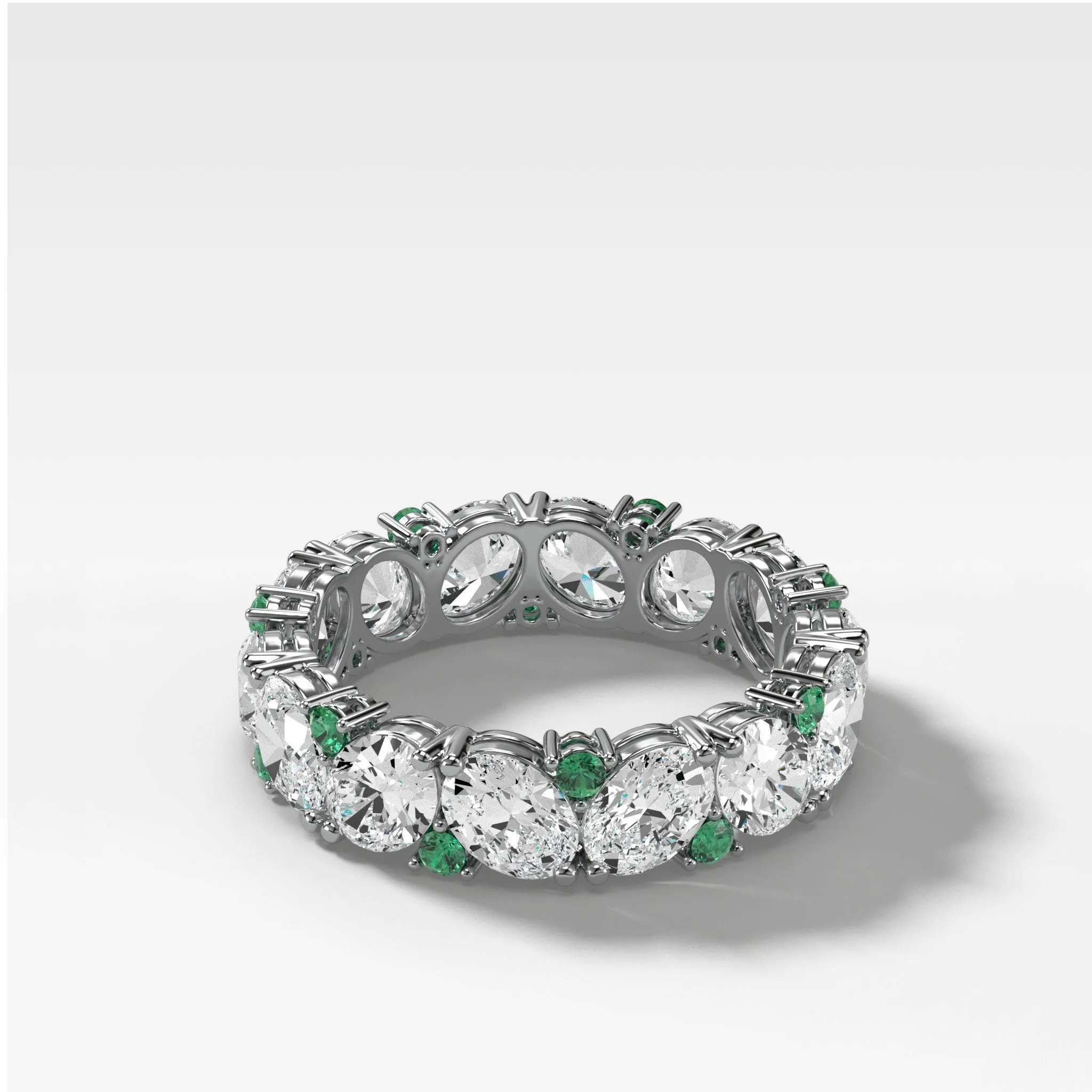 Oval Diamond and Green Emerald Medley Eternity Band