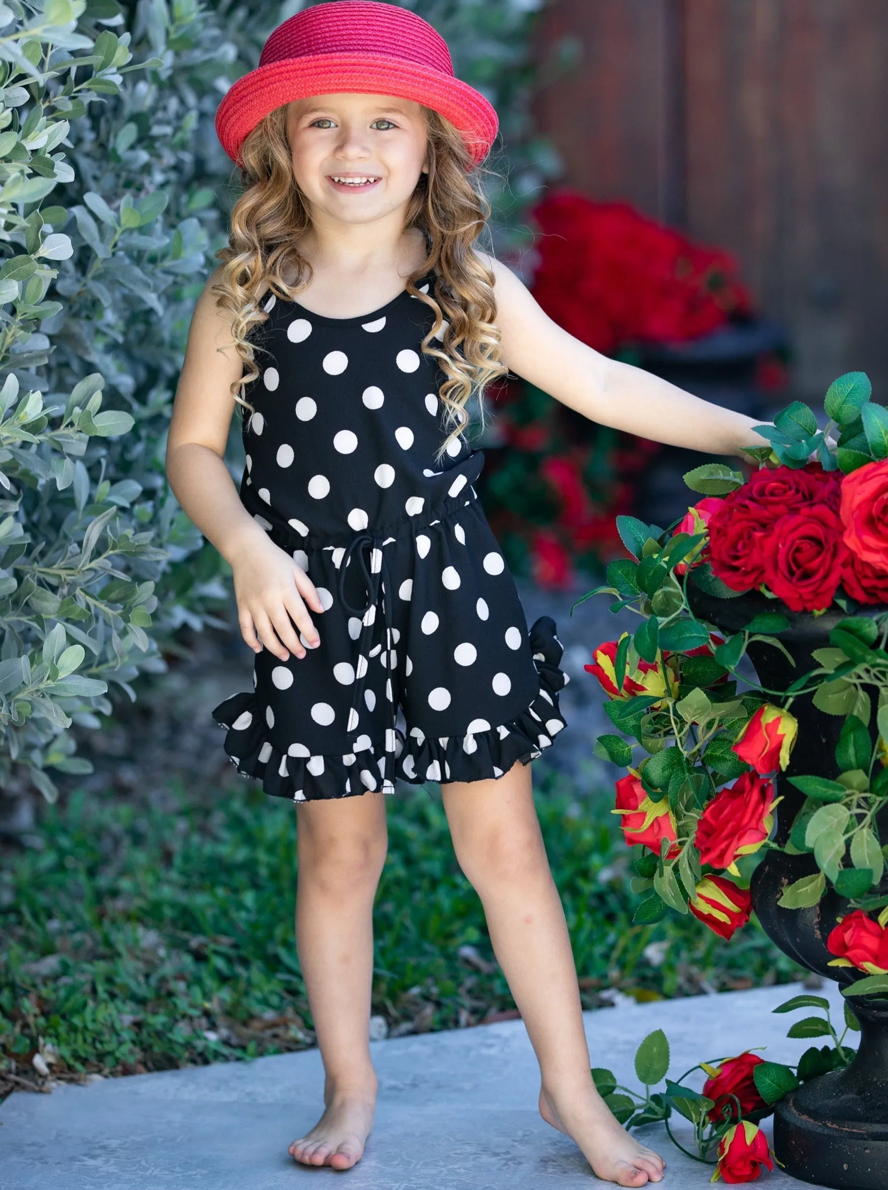 Some Like It Dot Ruffle Hem Romper