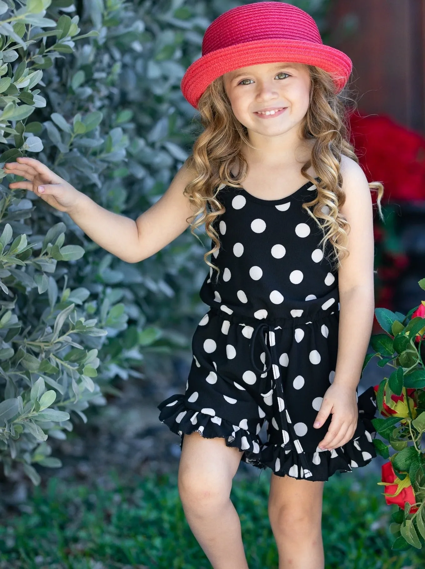Some Like It Dot Ruffle Hem Romper